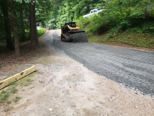  alt='Elevated land management solutions did a great job leveling and expanding my parents driveway'